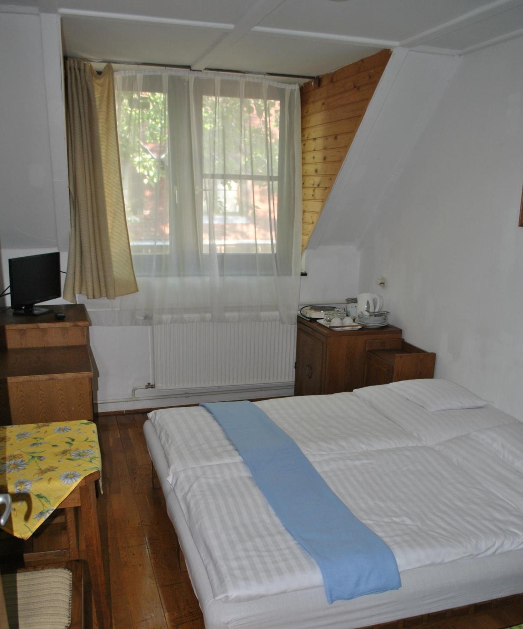 Harmónia Apartmanház Balatonlelle Habitación foto